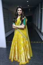 krithi-shetty-at-upenna-pre-release-event-in-yellow-lehenga2.jpg